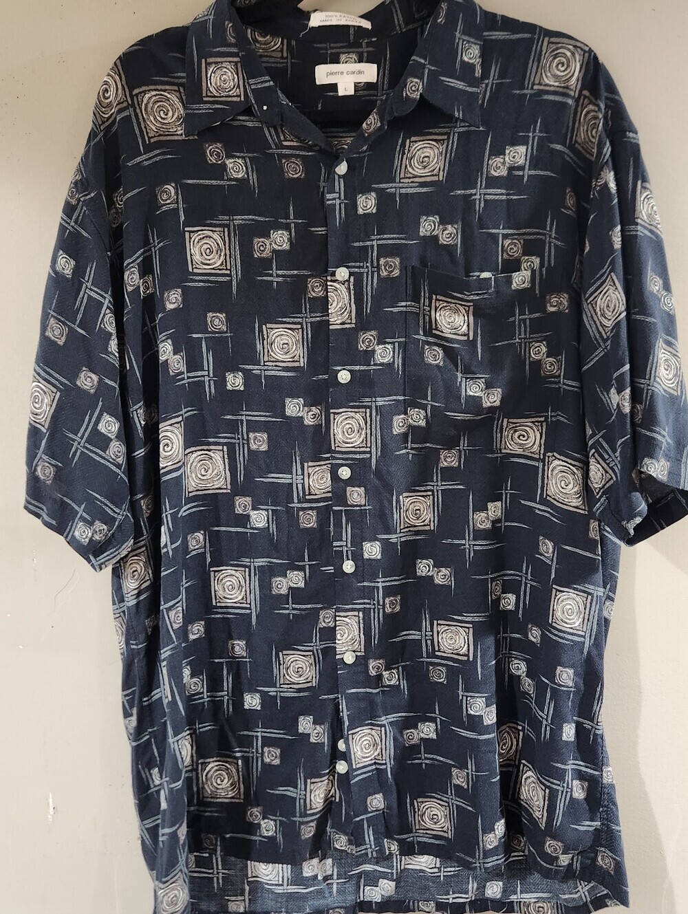 vintage Pierre Cardin men's short-sleeve button-down shirt featuring an abstract